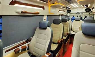 9 Seater Luxury Maharaja Tempo Traveller